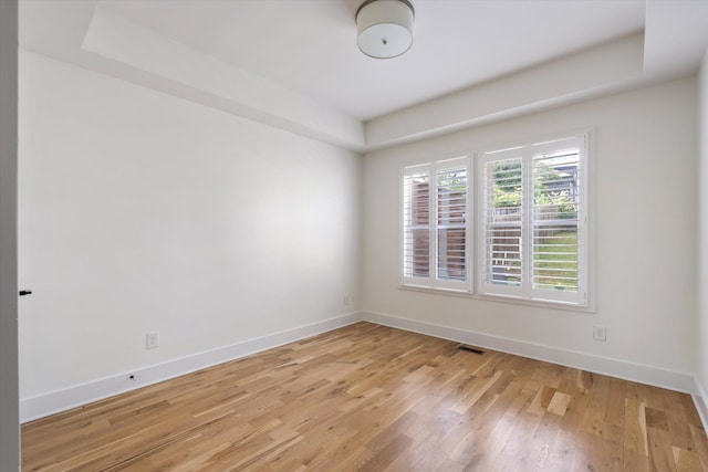 814A Horner Ave, Nashville, TN 37204 - spare room featuring light wood finished floors, baseboards, and a raised ceiling