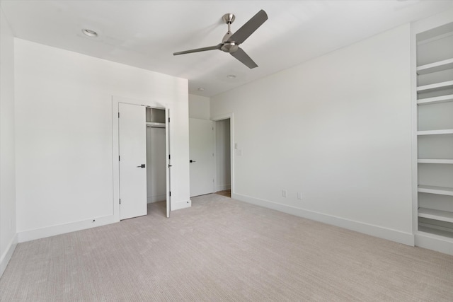 814A Horner Ave, Nashville, TN 37204 - unfurnished bedroom with light colored carpet, multiple closets, baseboards, and a ceiling fan