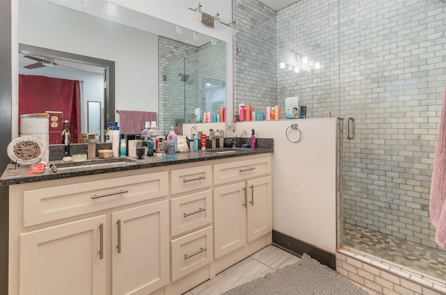 3802B Hutson Ave, Nashville, TN 37216 - full bathroom featuring a stall shower, vanity, and a ceiling fan