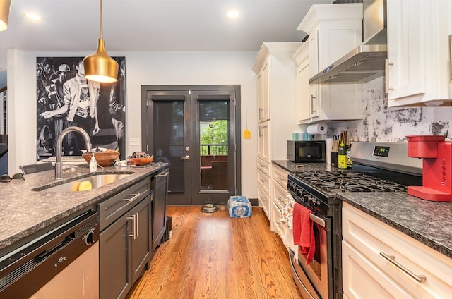 3802B Hutson Ave, Nashville, TN 37216 - kitchen with gas stove, a sink, dishwashing machine, wall chimney range hood, and black microwave