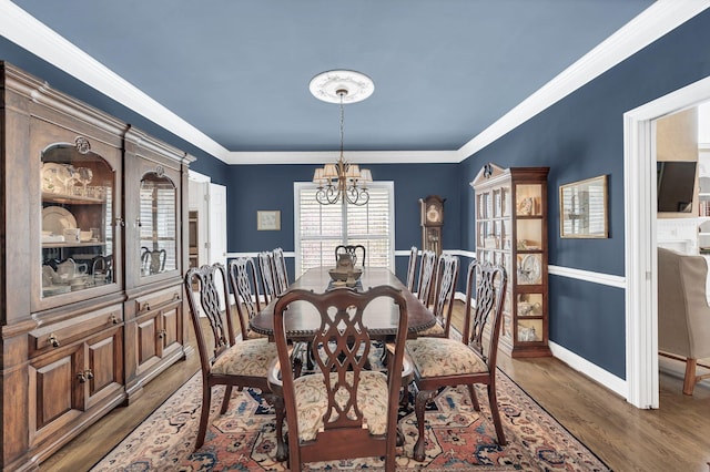 113 Abbeywood Dr, Nashville, TN 37215 - dining room featuring a chandelier, wood finished floors, and baseboards
