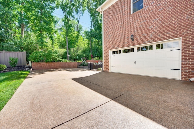 113 Abbeywood Dr, Nashville, TN 37215 - garage with concrete driveway and fence