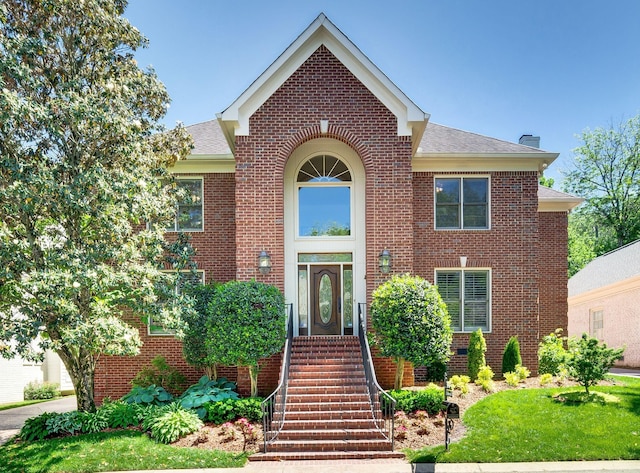 113 Abbeywood Dr, Nashville, TN 37215 - traditional-style house with brick siding, a shingled roof, and a chimney