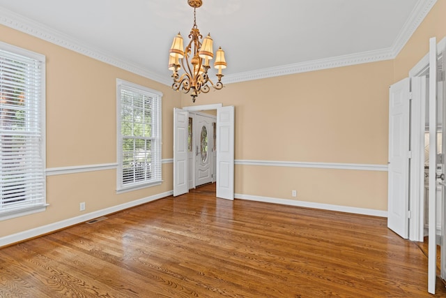 55 Revere Park, Nashville, TN 37205 - unfurnished room featuring a chandelier, wood finished floors, ornamental molding, and baseboards