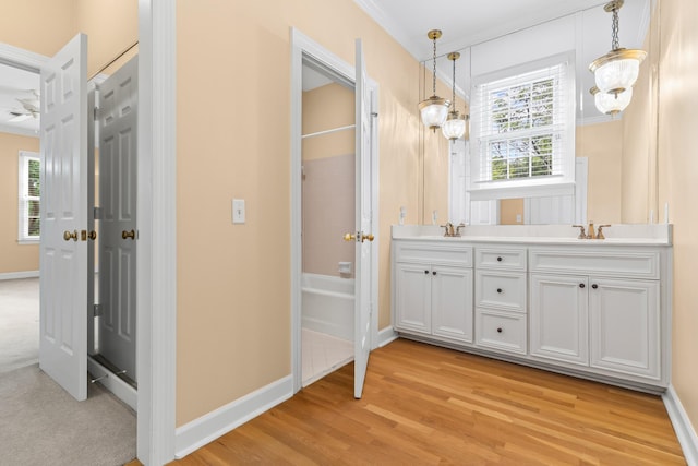 55 Revere Park, Nashville, TN 37205 - bathroom with double vanity, baseboards, and wood finished floors