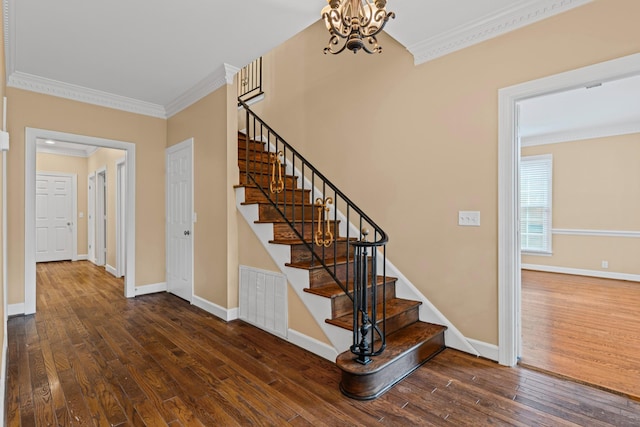55 Revere Park, Nashville, TN 37205 - stairway with ornamental molding, hardwood / wood-style flooring, a chandelier, and baseboards