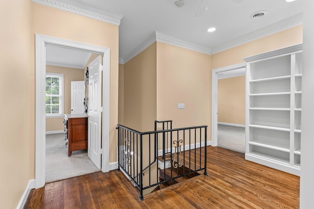 55 Revere Park, Nashville, TN 37205 - hall featuring an upstairs landing, wood finished floors, baseboards, and ornamental molding