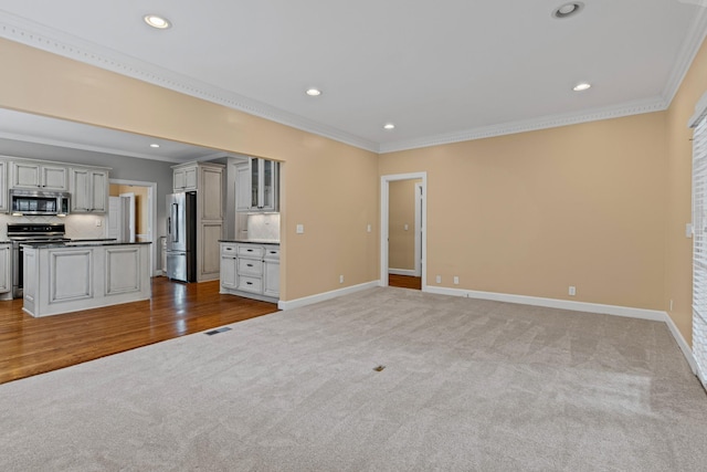 55 Revere Park, Nashville, TN 37205 - unfurnished living room featuring carpet floors, ornamental molding, baseboards, and recessed lighting