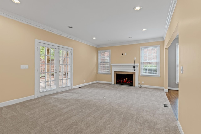 55 Revere Park, Nashville, TN 37205 - unfurnished living room with carpet floors, crown molding, baseboards, healthy amount of natural light, and recessed lighting