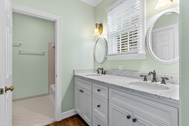 55 Revere Park, Nashville, TN 37205 - full bath with ornamental molding, double vanity, and wood finished floors