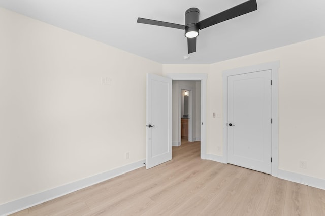 217 S Porter St S Unit 217, Winchester, TN 37398 - unfurnished bedroom featuring light wood-style flooring, baseboards, and ceiling fan