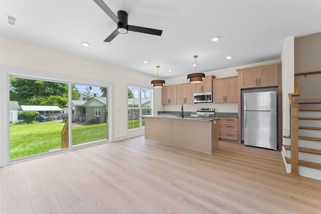 217 S Porter St S Unit 217, Winchester, TN 37398 - kitchen featuring stainless steel appliances, a sink, light wood finished floors, stone counters, and recessed lighting