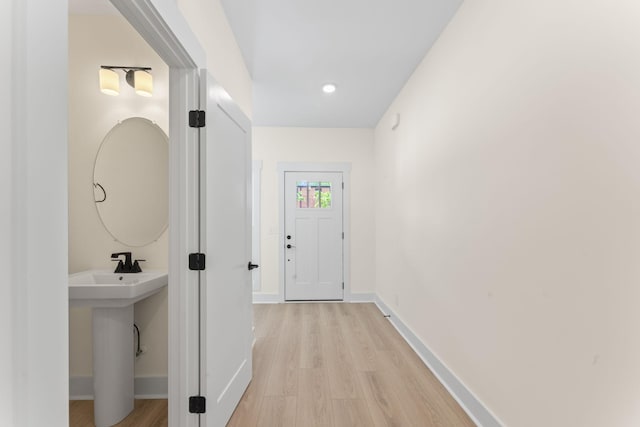 211 Porter St Unit 211, Winchester, TN 37398 - hall featuring light wood finished floors, baseboards, and recessed lighting