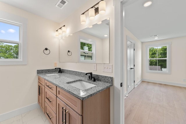 211 Porter St Unit 211, Winchester, TN 37398 - bathroom featuring baseboards and double vanity