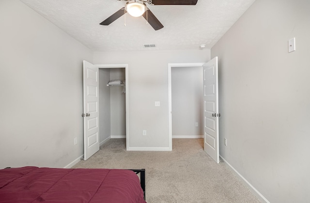 1840 Bethpage Dr, Murfreesboro, TN 37127 - carpeted bedroom with baseboards, ceiling fan, and a textured ceiling
