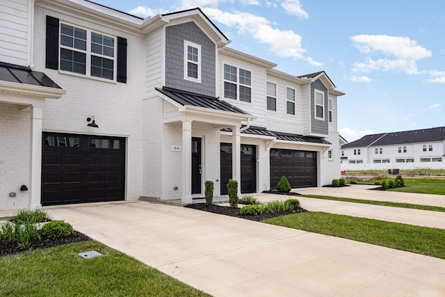 1840 Bethpage Dr, Murfreesboro, TN 37127 - multi unit property featuring a standing seam roof, a garage, concrete driveway, brick siding, and metal roof
