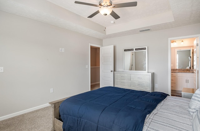 1840 Bethpage Dr, Murfreesboro, TN 37127 - carpeted bedroom featuring baseboards, a raised ceiling, ensuite bath, a ceiling fan, and a sink