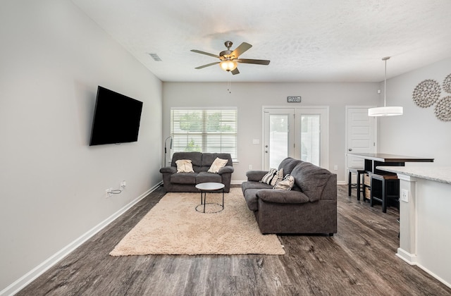1840 Bethpage Dr, Murfreesboro, TN 37127 - living area featuring dark wood finished floors, a ceiling fan, and baseboards