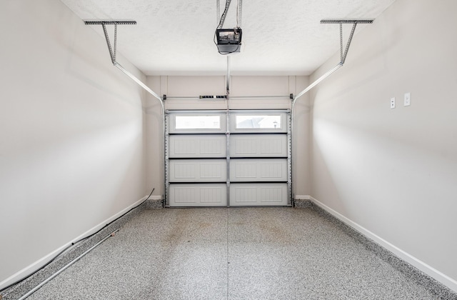 1840 Bethpage Dr, Murfreesboro, TN 37127 - garage featuring baseboards and a garage door opener