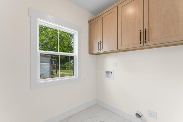 215 S Porter St Unit 215, Winchester, TN 37398 - clothes washing area with cabinet space, baseboards, hookup for a washing machine, light marble finish floors, and electric dryer hookup