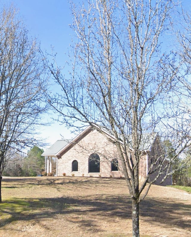 110 Hankins Rd, Hohenwald, TN 38462 - view of front of property with a front lawn