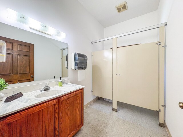 110 Hankins Rd, Hohenwald, TN 38462 - bathroom featuring baseboards, vanity, and tile patterned floors