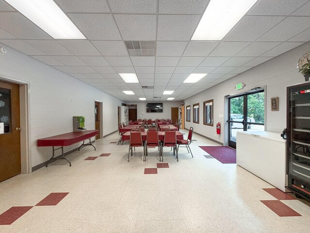 110 Hankins Rd, Hohenwald, TN 38462 - dining space featuring tile patterned floors and a paneled ceiling