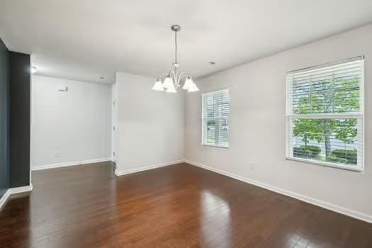 1470 Old Stone Rd, Lebanon, TN 37087 - unfurnished room with a chandelier, wood finished floors, and baseboards