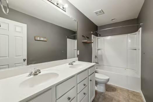 1470 Old Stone Rd, Lebanon, TN 37087 - bathroom featuring toilet, double vanity, and washtub / shower combination