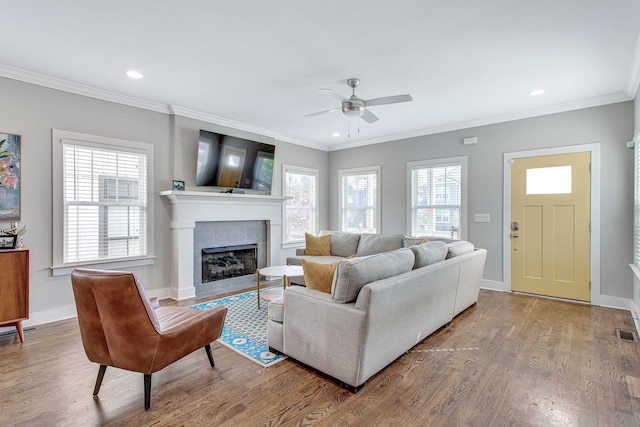 6214A California Ave, Nashville, TN 37209 - living area with wood finished floors, ceiling fan, a tile fireplace, recessed lighting, and ornamental molding