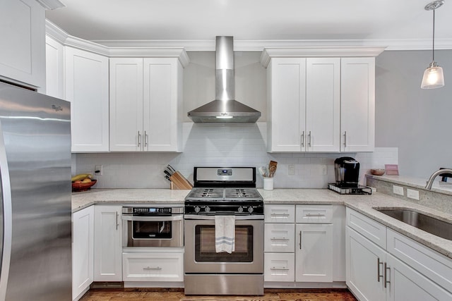 6214A California Ave, Nashville, TN 37209 - kitchen with stainless steel appliances, wall chimney exhaust hood, a sink, white cabinetry, and ornamental molding