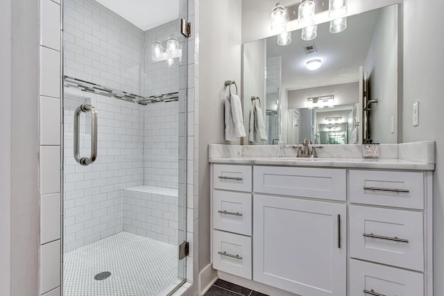 6214A California Ave, Nashville, TN 37209 - bathroom with a shower stall, vanity, and tile patterned flooring