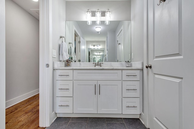 6214A California Ave, Nashville, TN 37209 - bathroom with vanity, baseboards, and tile patterned floors