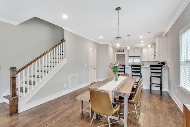 6214A California Ave, Nashville, TN 37209 - dining area with stairs, ornamental molding, dark wood-type flooring, baseboards, and recessed lighting