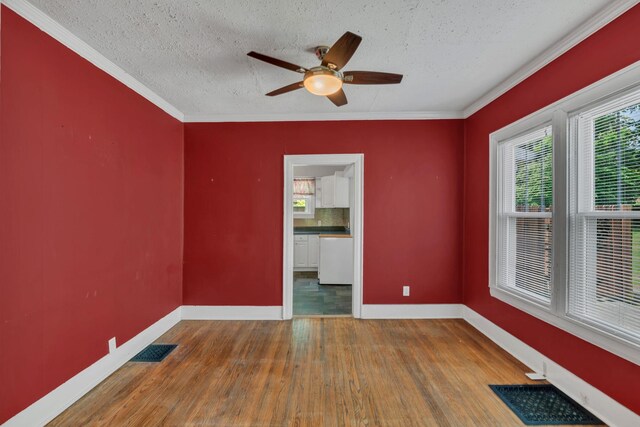 521 E Eastland St, Gallatin, TN 37066 - spare room with wood finished floors, baseboards, a textured ceiling, a ceiling fan, and ornamental molding