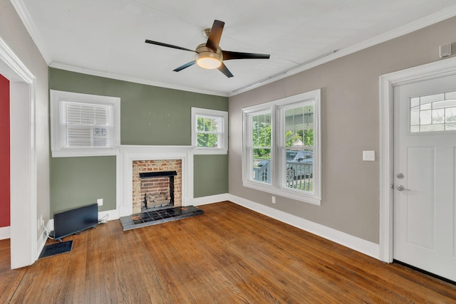 521 E Eastland St, Gallatin, TN 37066 - unfurnished living room with wood finished floors, a ceiling fan, baseboards, a fireplace, and ornamental molding