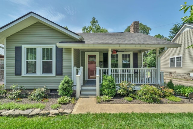 521 E Eastland St, Gallatin, TN 37066 - bungalow-style house featuring covered porch, a chimney, a shingled roof, and crawl space