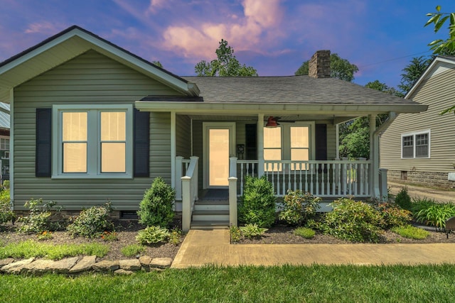 521 E Eastland St, Gallatin, TN 37066 - bungalow with covered porch, a chimney, crawl space, and a shingled roof