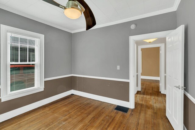 521 E Eastland St, Gallatin, TN 37066 - unfurnished room with wood finished floors, crown molding, baseboards, and a smoke detector