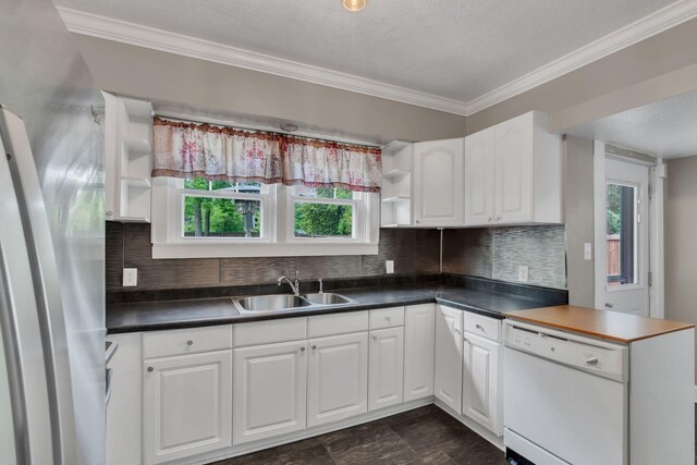 521 E Eastland St, Gallatin, TN 37066 - kitchen with dishwasher, open shelves, ornamental molding, white cabinetry, and dark countertops