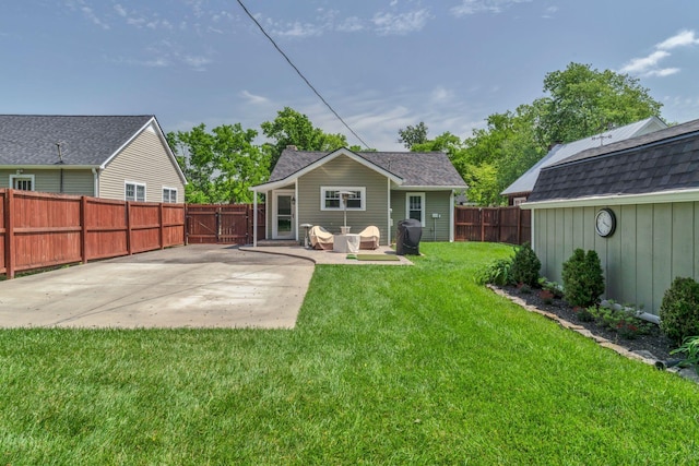 521 E Eastland St, Gallatin, TN 37066 - back of house with a patio, a gate, and a shingled roof