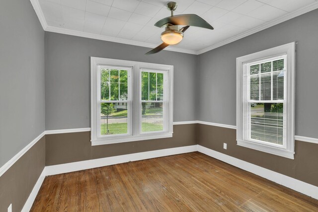 521 E Eastland St, Gallatin, TN 37066 - spare room with wood finished floors, ceiling fan, baseboards, and crown molding