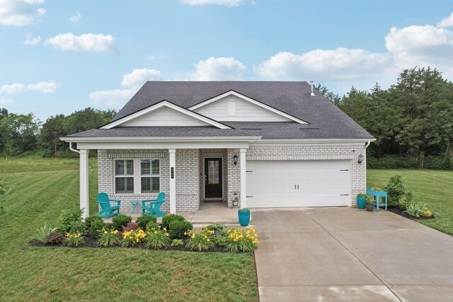 3706 Bonnie Blue Ct, Rockvale, TN 37153 - traditional home with covered porch, brick siding, a front lawn, and an attached garage