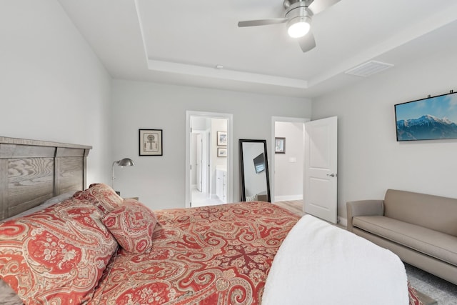 3706 Bonnie Blue Ct, Rockvale, TN 37153 - bedroom with a tray ceiling, ceiling fan, and connected bathroom