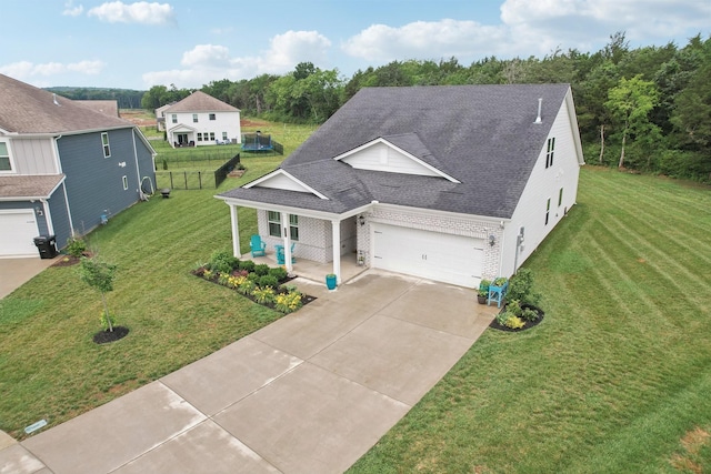 3706 Bonnie Blue Ct, Rockvale, TN 37153 - view of front facade featuring a porch, concrete driveway, roof with shingles, a garage, and brick siding