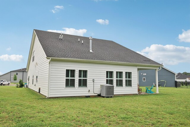 3706 Bonnie Blue Ct, Rockvale, TN 37153 - back of house featuring cooling unit, a lawn, and roof with shingles