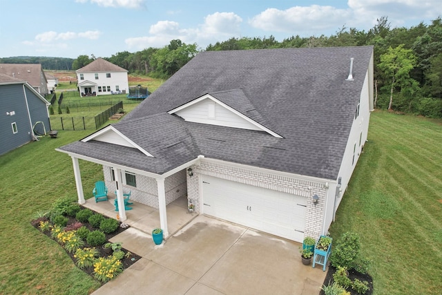 3706 Bonnie Blue Ct, Rockvale, TN 37153 - view of front facade with a shingled roof, concrete driveway, a garage, and brick siding