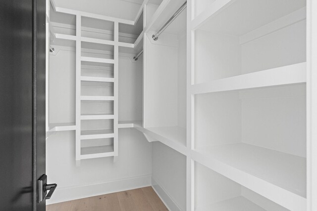 219 Chamberlin St, Nashville, TN 37209 - walk in closet with wood finished floors