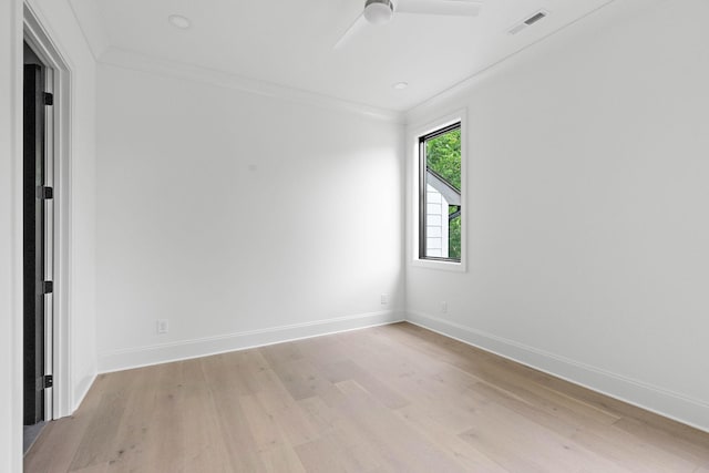 219 Chamberlin St, Nashville, TN 37209 - empty room featuring light wood-style flooring, baseboards, ceiling fan, and crown molding