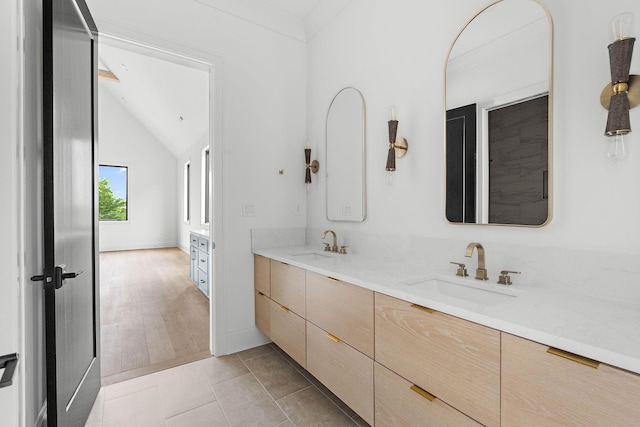 219 Chamberlin St, Nashville, TN 37209 - full bathroom featuring double vanity and lofted ceiling